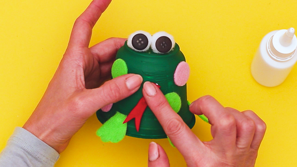 Learn how to make a recycled frog craft with the kids this Spring! Whether it's for a spring themed craft or learning about the life cycle of a frog.