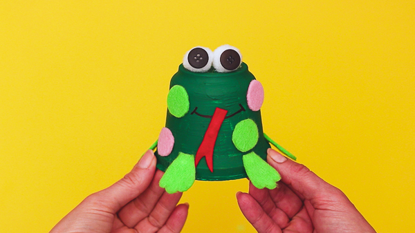 Learn how to make a recycled frog craft with the kids this Spring! Whether it's for a spring themed craft or learning about the life cycle of a frog.