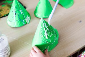 Cute, simple and perfect for toddlers and preschoolers! this simple 3d Paper Plate Christmas Tree craft is perfect for developing fine motor skills while getting into the festive spirit! An easy Christmas craft for preschool or group craft sessions.