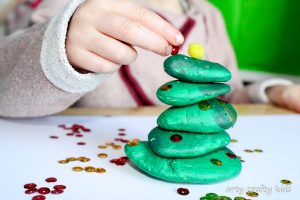 Arty Crafty Kids | Play | Fine Motor Pebble Stacking Christmas Tree | This pebble stacking fine motor Chrismas Tree activity is an awesome challenging game that encourages problem solving, hand eye-cordinaton and fine motor skills!