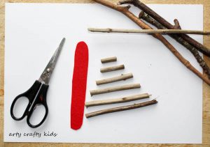 Our rustic Twig Christmas Tree Ornament is kid-made and inspired by Julia Donaldson's Stick Man. An easy Christmas craft for kids, that's great fine motor practice.