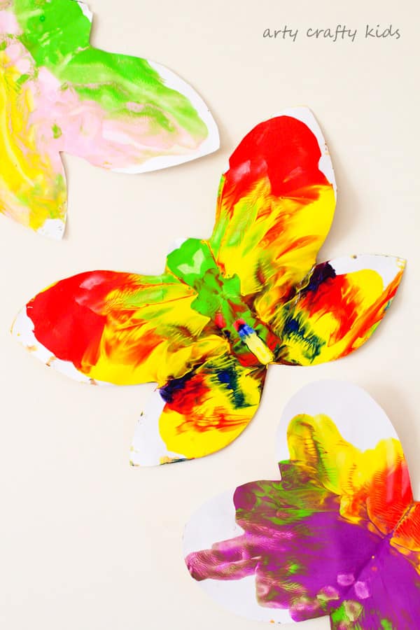 Arty Crafty Kids | Art | Easy Butterfly Kids Art | A butterfly twist on a classic process art project for kids. Sweet and simple for toddlers and preschoolers, a perfect Spring Craft for Kids!