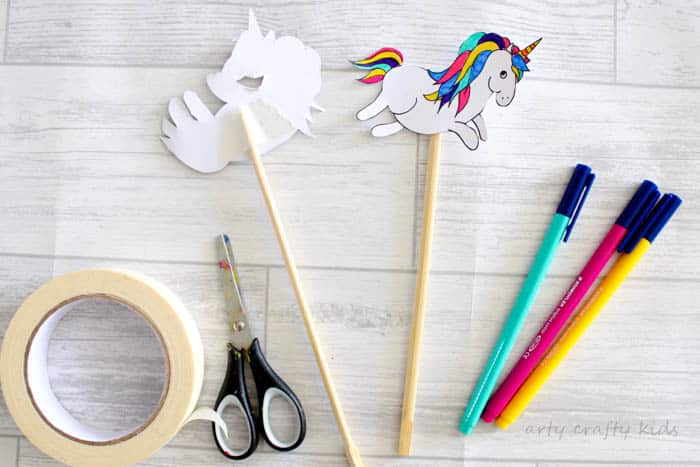 Arty Crafty Kid | Craft | Over the Rainbow Paper Plate Unicorn Puppets | Using the free Unicorn download, cut and colour to create playful puppets, who love to jump, slide and dance over the cute paper plate rainbow! A fun interactive craft and play craft idea for kids!