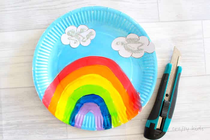 Arty Crafty Kid | Craft | Over the Rainbow Paper Plate Unicorn Puppets | Using the free Unicorn download, cut and colour to create playful puppets, who love to jump, slide and dance over the cute paper plate rainbow! A fun interactive craft and play craft idea for kids!