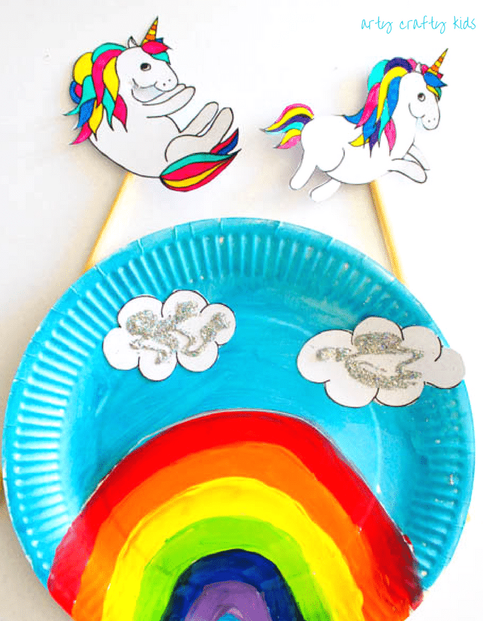 Arty Crafty Kid | Craft | Over the Rainbow Paper Plate Unicorn Puppets | Using the free Unicorn download, cut and colour to create playful puppets, who love to jump, slide and dance over the cute paper plate rainbow! A fun interactive craft and play craft idea for kids!