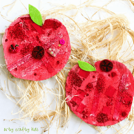 Arty Crafty Kids | Craft Ideas for Kids | Autumn Crafts | Easy Apple Collage Craft | A fun back to school and Autumn Apple Craft for Kids, using loose parts within the theme of 'Red' to create an apple.