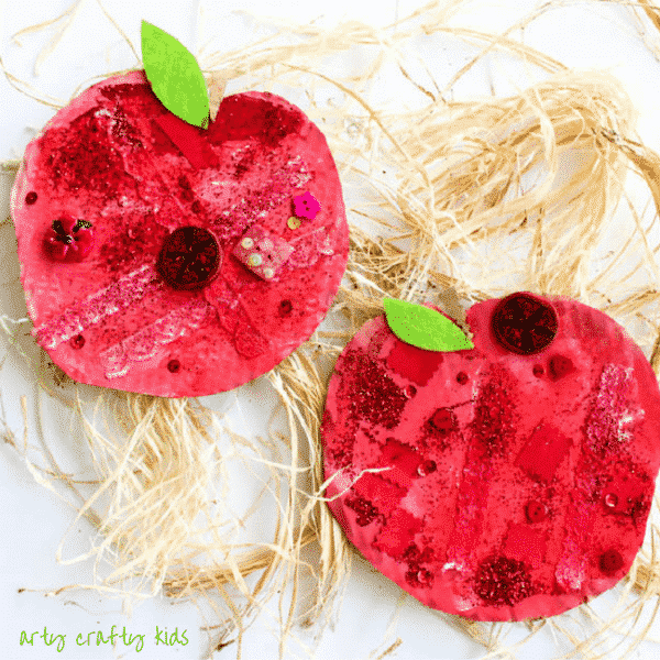 Easy Apple Collage Craft Arty Crafty Kids | Craft Ideas for Kids | Autumn Crafts | Easy Apple Collage Craft | A fun back to school and Autumn Apple Craft for Kids, using loose parts within the theme of 'Red' to create an apple.