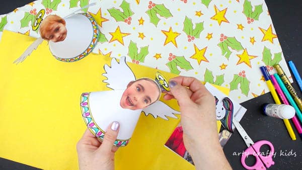 Arty Crafty Kids | Christmas Crafts for Kids | Adorable Paper Angel Christmas Ornament for Kids, includes a free template for kids to design, colour and cut! #christmascraft #papercraft #christmascraftsforkids #christmasornament #freedownload