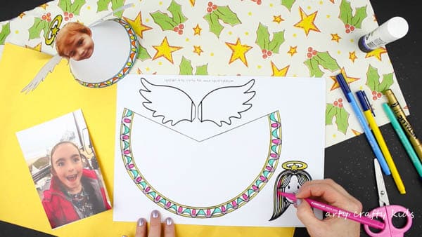 Arty Crafty Kids | Christmas Crafts for Kids | Adorable Paper Angel Christmas Ornamant for Kids, includes a free template for kids to design, colour and cut! #christmascraft #papercraft #christmascraftsforkids #christmasornament #freedownload