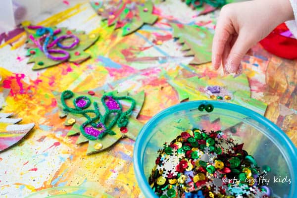 Arty Crafty Kids | Christmas Craft | Cardboard Christmas Tree Garland Craft for Kids | A process led Christmas Tree craft for kids.