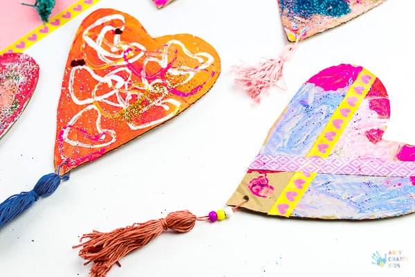 Arty Crafty Kids | Crafts for Kids | Recycled Cardboard Heart Decorations - A process led heart project for kids using recycled cardboard #hearts #kidscrafts #easycraftsforkids