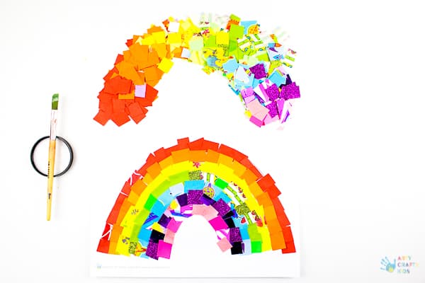 Arty Crafty Kids | Art Ideas for Kids | Rainbow Paper Collage | A fabulous rainbow paper collage activity that promotes cutting skills & colour play within a free rainbow template for kids to follow #rainbowart #preschoolart #craftsforpreschoolers #kidscrafts #scissorskills