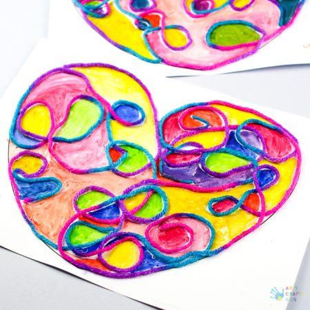 Arty Crafty Kids | Art Ideas for Kids | Yarn Squiggle Heart Art | A fun process art idea for kids, using yarn and watercolour paints to create a cute heart. A simple and fun art project for Valentine's Day! #Valentinesday #artforkids #easyartforkids