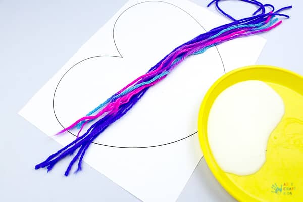 Arty Crafty Kids | Art Ideas for Kids | Yarn Squiggle Heart Art | A fun process art idea for kids, using yarn and watercolour paints to create a cute heart. A simple and fun art project for Valentine's Day! #Valentinesday #artforkids #easyartforkids