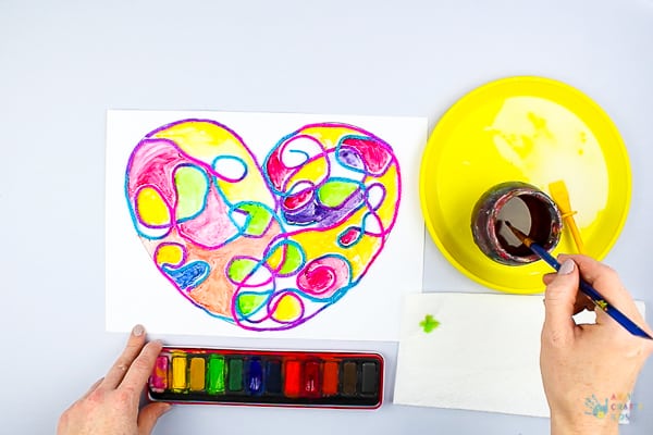 Arty Crafty Kids | Art Ideas for Kids | Yarn Squiggle Heart Art | A fun process art idea for kids, using yarn and watercolour paints to create a cute heart. A simple and fun art project for Valentine's Day! #Valentinesday #artforkids #easyartforkids