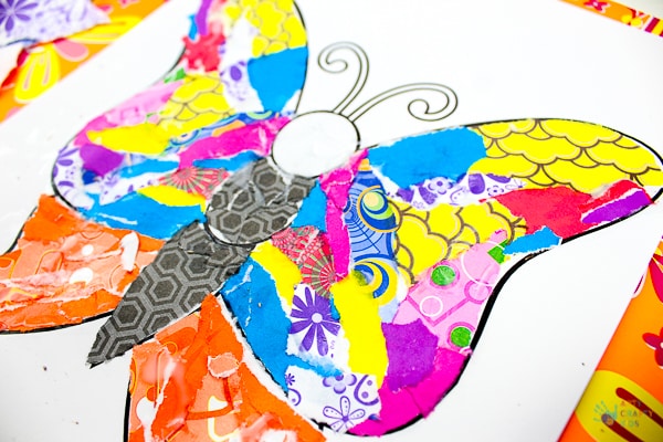 Arty Crafty Kids | Art | Butterly Paper Collage - A simple activity using torn scrap paper to create a colourful, textured butterfly. A wonderful craft for kids! #artycraftykids #recycledcraft #easykidscraft #craftsforkids #kidsart #artideasforkids #easykidsactivities