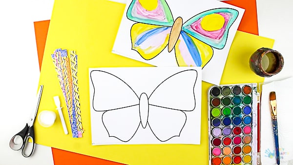 Arty Crafty Kids | Craft | Woven Paper Butterfly Craft - A sweet and simple Spring & Summer craft for kids, that's great for kids working on their fine motor skills. It's also very pretty too! #butterflycraft #kidscrafts #craftsforkids #easykidscrafts #craftideasforkids #summercrafts #springcrafts #minibeasts