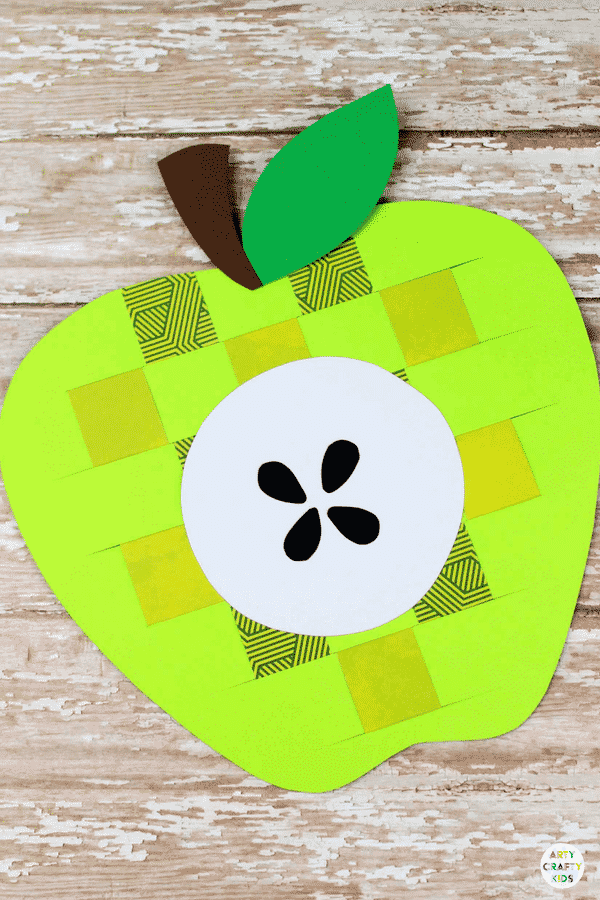 Arty Crafty Kids - Craft Ideas for Kids - Paper Apple Weaving Craft for Kids - A sweet Apple kids craft to kickstart the new school term and the beginning of Autumn. Great for developing fine motor skills and for little hands to learn basic weaving techniques #kidscraft #applecraft #craftsforkids #papercraft