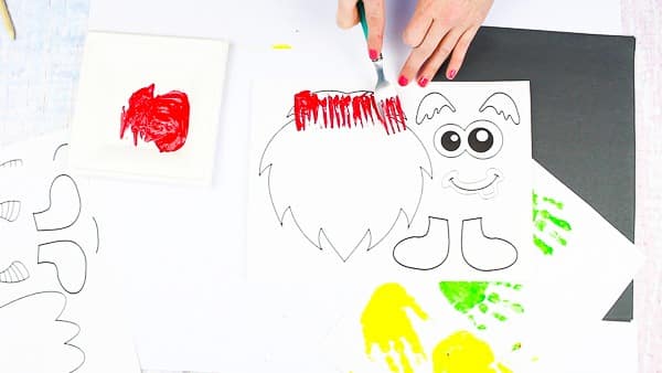 Arty Crafty Kids | Big Hand Paper Monster Craft - Add your Arty Crafty Kids handprint to create a moving grooving Big Hand Monster! A fun and playful monster craft for Halloween, with a choice of 4 monster templates.