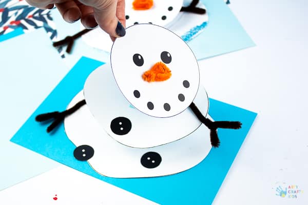 Arty Crafty Kids - Melting Snowman Paper Craft, with a handy printable template included. A fun and easy snowman craft that really melts! Make its head wobble and body shrink into the paper #kidscrafts #christmas #christmascrafts #winter #snowman