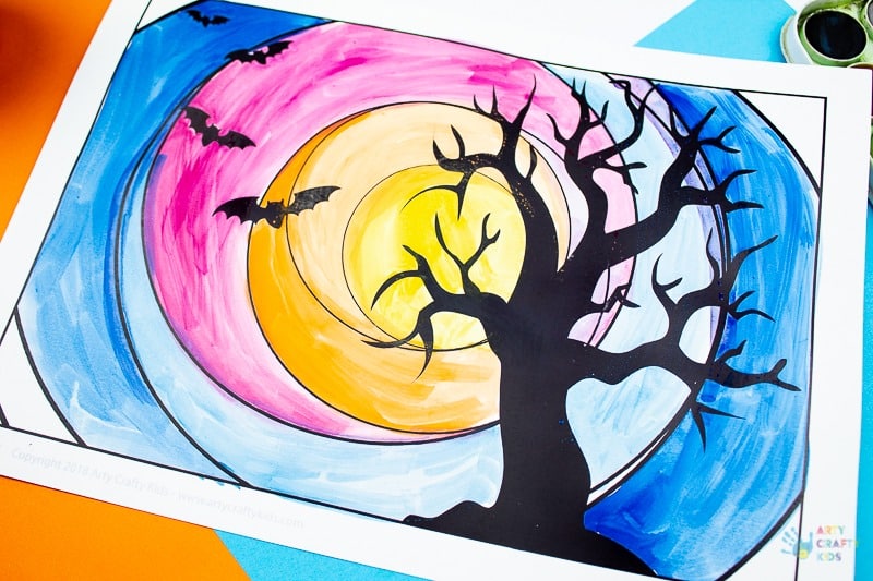 Arty Crafty Kids - Spooky Tree Circle Art for Halloween. Explore cool and warm shades with this simple template design. Perfect Art Project for kids exploring colour mixing and colour shades #artforkids #kidsart #halloween