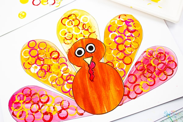 Arty Crafty Kids - Circle Print Button Turkey Craft for Kids - A fun and simple Thanksgiving craft for kids with a free template included!