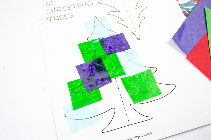 Arty Crafty Kids | 3D Printable Christmas Tree Craft - A fun paper Christmas tree craft for kids. Download, print and decorate with tissue paper, buttons and fingerprints! #printable #christmascraft #kidscrafts #christmas #papercraft #kids