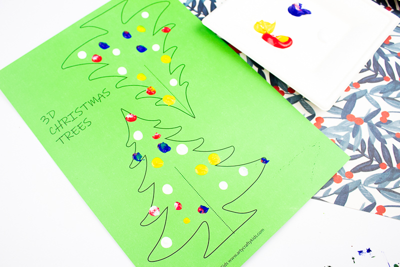 Arty Crafty Kids | 3D Printable Christmas Tree Craft - A fun paper Christmas tree craft for kids. Download, print and decorate with tissue paper, buttons and fingerprints! #printable #christmascraft #kidscrafts #christmas #papercraft #kids