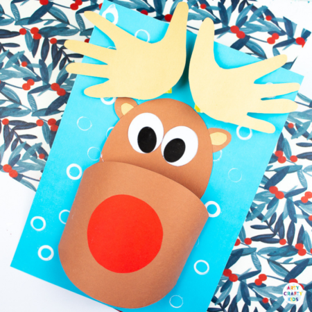 Arty Crafty Kids | 3D Printable Rudolph Craft for Kids. Play with shapes and dimension to create a cool 3D Reindeer with bouncy handprint antler! A fun and engaging Christmas craft for kids #christmas #printable #papercraft #christmascrafts #kids #kidscrafts