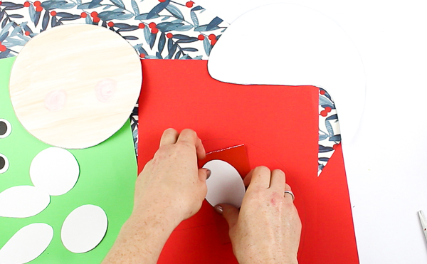 Arty Crafty Kids | Printable Paper Santa Craft - An engaging and fun Paper Santa Craft for kids. With his bouncy nose and curly beard, it's a Christmas craft that promotes scissor skills and fine motor development #christmas #christmascraft #printable #kidscraft #template