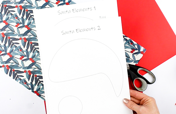 Arty Crafty Kids | Printable Paper Santa Craft - An engaging and fun Paper Santa Craft for kids. With his bouncy nose and curly beard, it's a Christmas craft that promotes scissor skills and fine motor development #christmas #christmascraft #printable #kidscraft #template