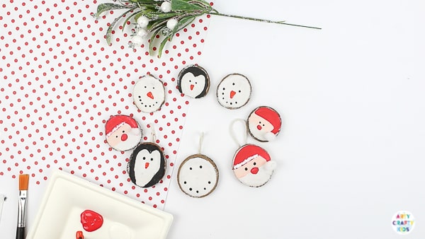 Arty Crafty Kids | How to Make Wood Slice Christmas Ornaments - An easy Christmas Ornament for kids to make. Follow our tutorial to create a Santa Claus, Snowman and Penguin Ornaments #kidscrafts #christmascrafts #kids #christmas