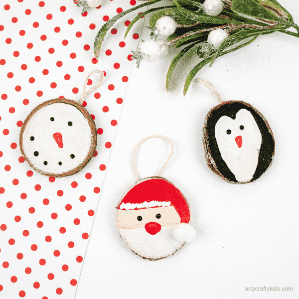 Arty Crafty Kids | How to Make Wood Slice Christmas Ornaments - An easy Christmas Ornament for kids to make. Follow our tutorial to create a Santa Claus, Snowman and Penguin Ornaments #kidscrafts #christmascrafts #kids #christmas