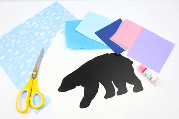 Arty Crafty Kids | Polar Bear Winter Art - Download and print the Polar Bear template and add it to a winter backdrop of tissue paper #winterart #artforkids #templates
