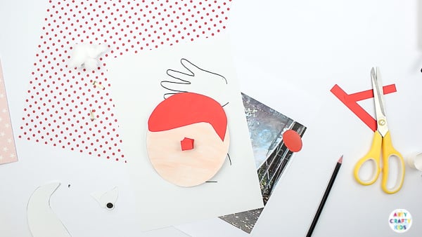 Arty Crafty Kids | Santa Handprint Craft - A printable Santa Christmas Card craft for kids! simply unfold the handprint beard to reveal your Arty Crafty Kid wishing loved ones a Merry Christmas #printable #christmascraft #kidscraft