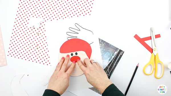 Arty Crafty Kids | Santa Handprint Craft - A printable Santa Christmas Card craft for kids! simply unfold the handprint beard to reveal your Arty Crafty Kid wishing loved ones a Merry Christmas #printable #christmascraft #kidscraft