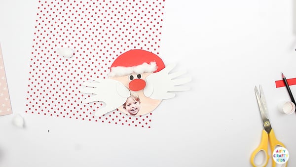 Arty Crafty Kids | Santa Handprint Craft - A printable Santa Christmas Card craft for kids! simply unfold the handprint beard to reveal your Arty Crafty Kid wishing loved ones a Merry Christmas #printable #christmascraft #kidscraft