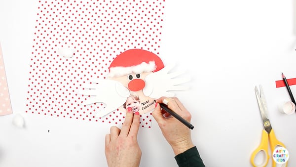 Arty Crafty Kids | Santa Handprint Craft - A printable Santa Christmas Card craft for kids! simply unfold the handprint beard to reveal your Arty Crafty Kid wishing loved ones a Merry Christmas #printable #christmascraft #kidscraft