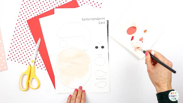 Arty Crafty Kids | Santa Handprint Craft - A printable Santa Christmas Card craft for kids! simply unfold the handprint beard to reveal your Arty Crafty Kid wishing loved ones a Merry Christmas #printable #christmascraft #kidscraft