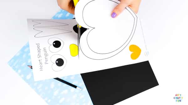 Arty Crafty Kids | Super cute and easy Printable Penguin Heart Craft for kids. A great craft that fits into both valentine's day and winter themed crafts. Simply download and print the template to get started! #kidscraft #templates #printables #easycrafts #papercrafts #teachers