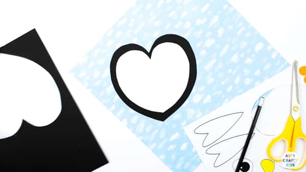 Arty Crafty Kids | Super cute and easy Printable Penguin Heart Craft for kids. A great craft that fits into both valentine's day and winter themed crafts. Simply download and print the template to get started! #kidscraft #templates #printables #easycrafts #papercrafts #teachers