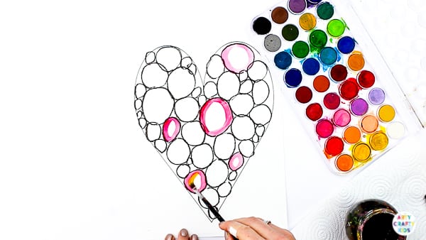 Arty Crafty Kids | Kandinsky Heart Art Project - a simple art idea for kids that explores colour-mixing and encourages children to play with colour combinations. #artycraftykids