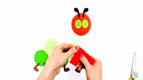 Arty Crafty Kids | The Very Hungry Caterpillar Printable Craft for kids to make. Perfect for covering bug and butterfly life-cycle topics. Download the Caterpillar Template to get started @artycraftykids