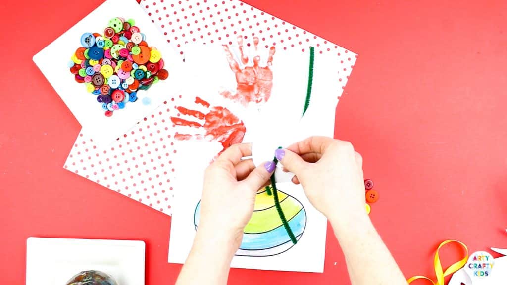 Mother's Day Handprint Flower Craft for kids to make. Simply download the printable template to get started. @artycraftykids