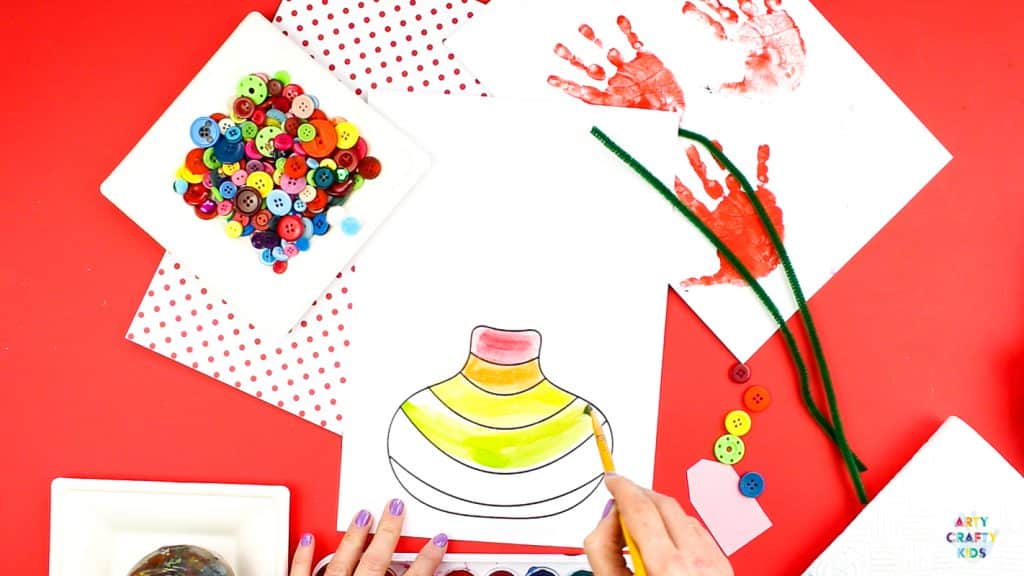 Mother's Day Handprint Flower Craft for kids to make. Simply download the printable template to get started. @artycraftykids