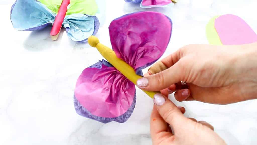 A step-by-step guide for How to Make to a Clothespin Butterfly.