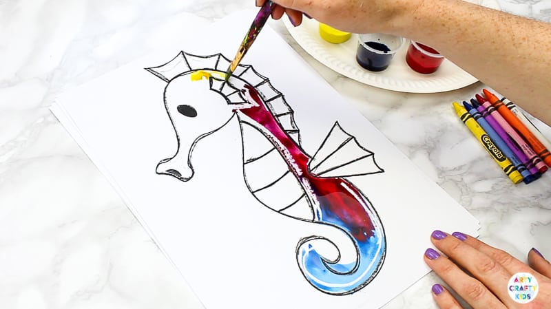 Ocean Animal Watercolor Painting for Kids - Watercolor resist Seahorse with crayons. A quick and easy art project that kids will love!