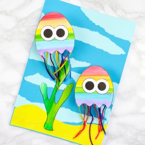 Kick start a summer craft session with this printable paper jellyfish craft for kids. The jellyfish wobble, bounce and swim, making this under sea craft super fun and engaging #artycraftykids #underthesea #kidscrafts