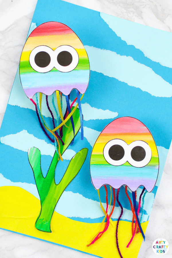 Kick start a summer craft session with this printable paper jellyfish craft for kids. The jellyfish wobble, bounce and swim, making this under sea craft super fun and engaging #artycraftykids #underthesea #kidscrafts