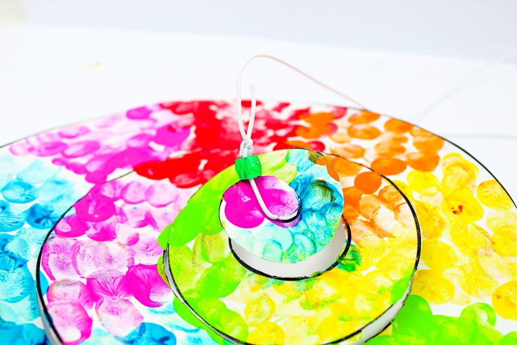 Arty Crafty Kids | Printable Spiral Snake Mobile Craft for Kids | This super cute snake craft is a fantastic scissors skills project for kids in preschool, kindergarten and primary school #artycraftykids